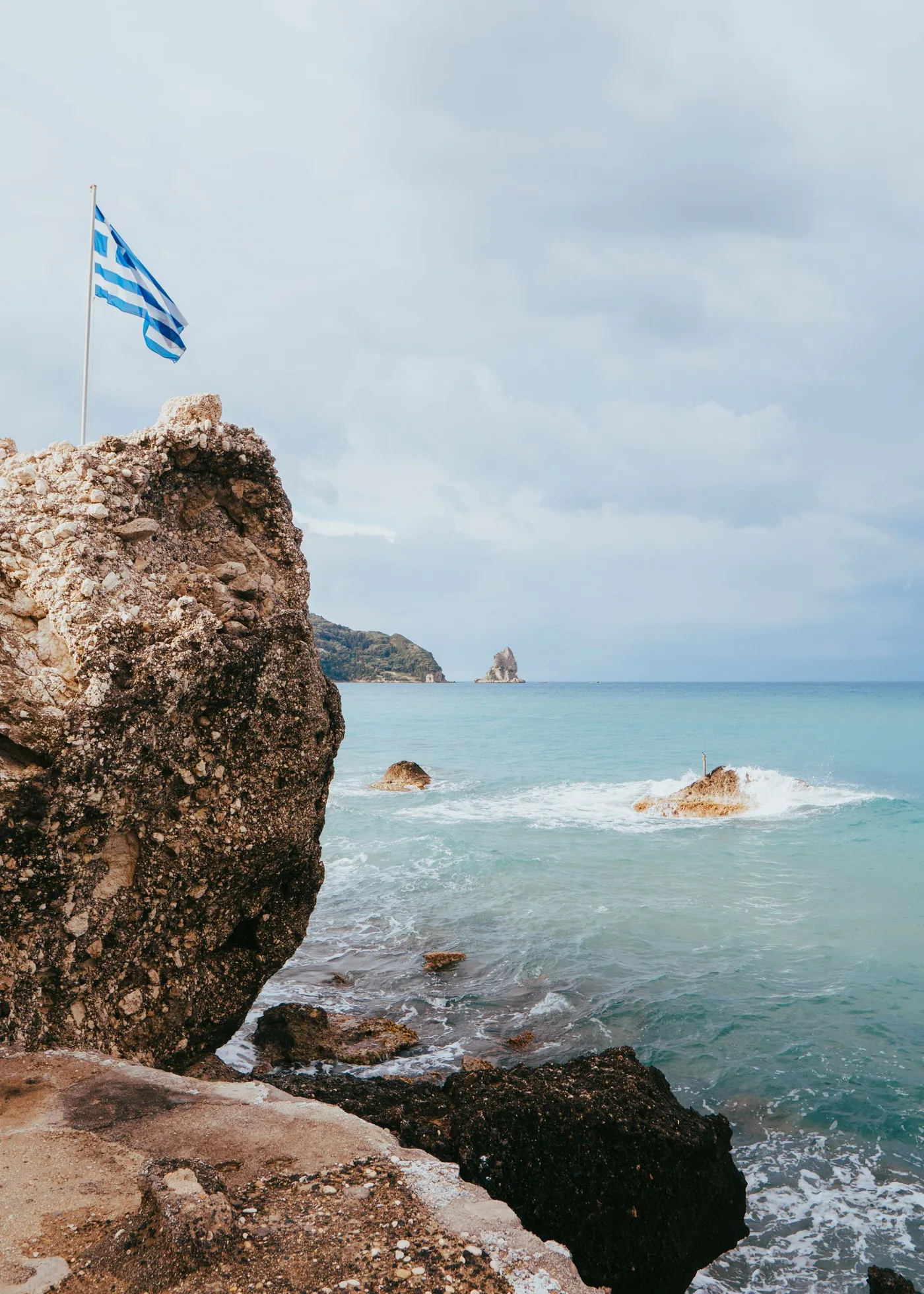 Greek flag over the Cretan sea